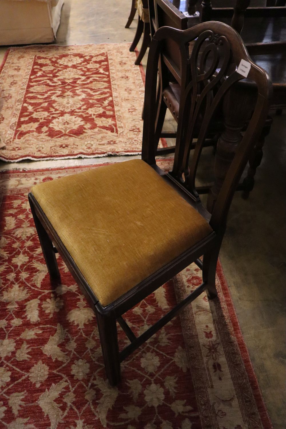 A pair of George III mahogany dining chairs